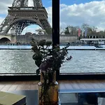 Mind-Blowing Eiffel Tower Houseboat